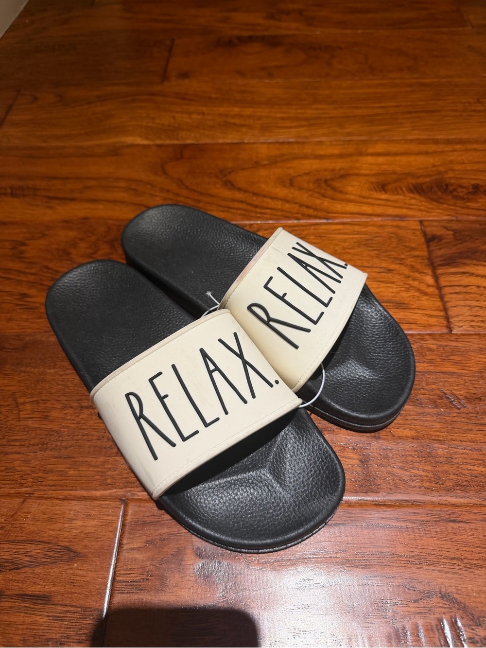 Rae Dunn Black and Cream 'RELAX' Slide Sandals